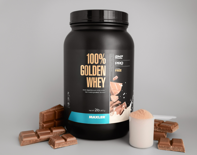 A photo of a 100% Golden Whey container and a cup.