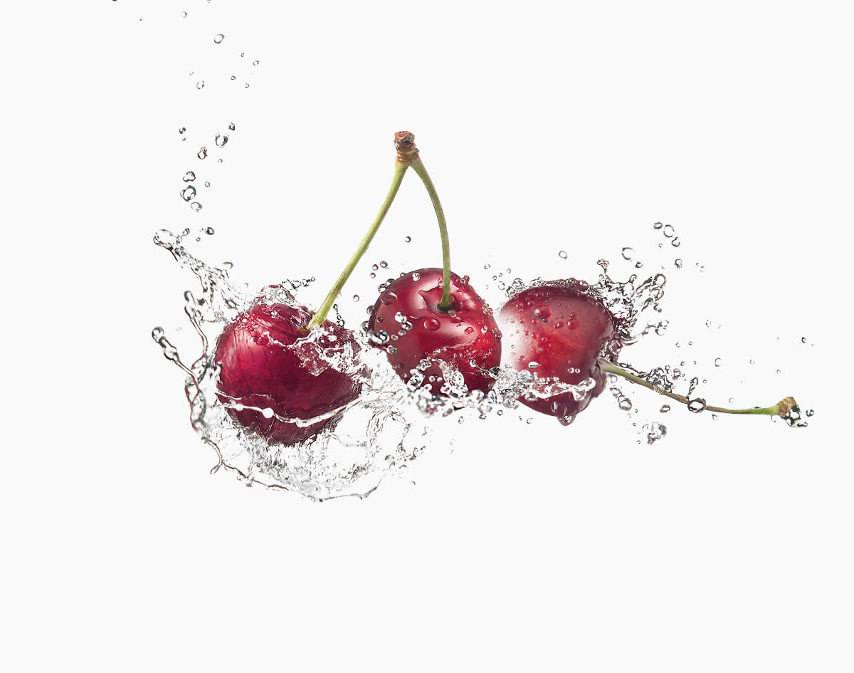 Splash of fresh cherries in water representing Maxler Biotin 6000 mcg natural cherry flavor