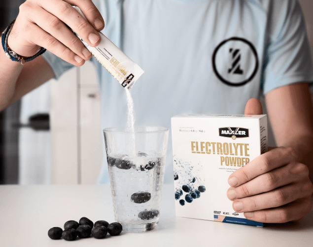 Pouring a stick of Electrolyte Powder in water