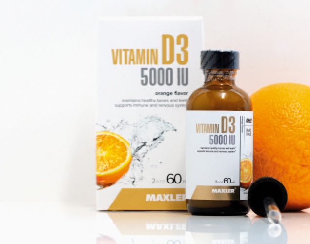 Maxler Vitamin D3 5000 IU liquid supplement bottle with packaging and fresh orange, emphasizing its orange flavor and health benefits for bone and immune support