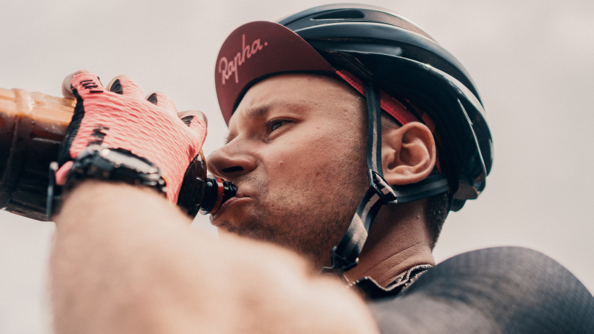 A man holding a bicycle