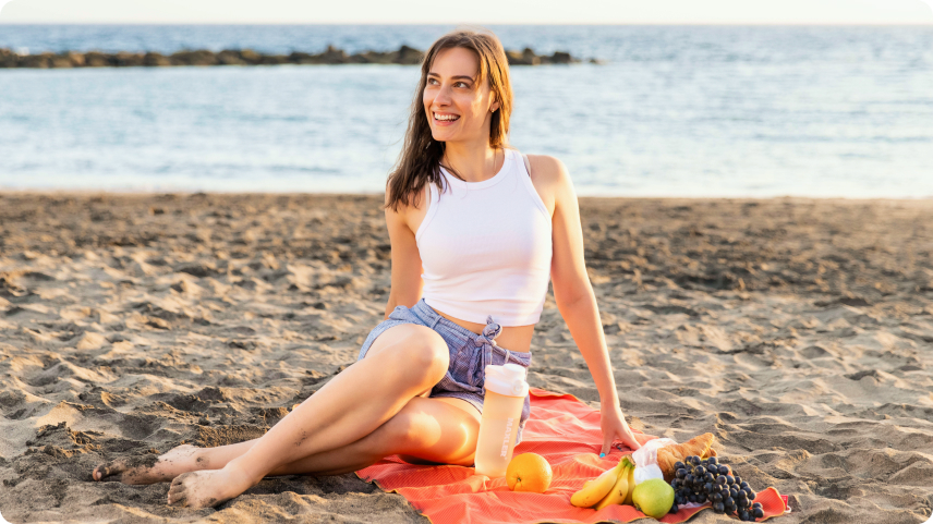 A woman sitting on sand