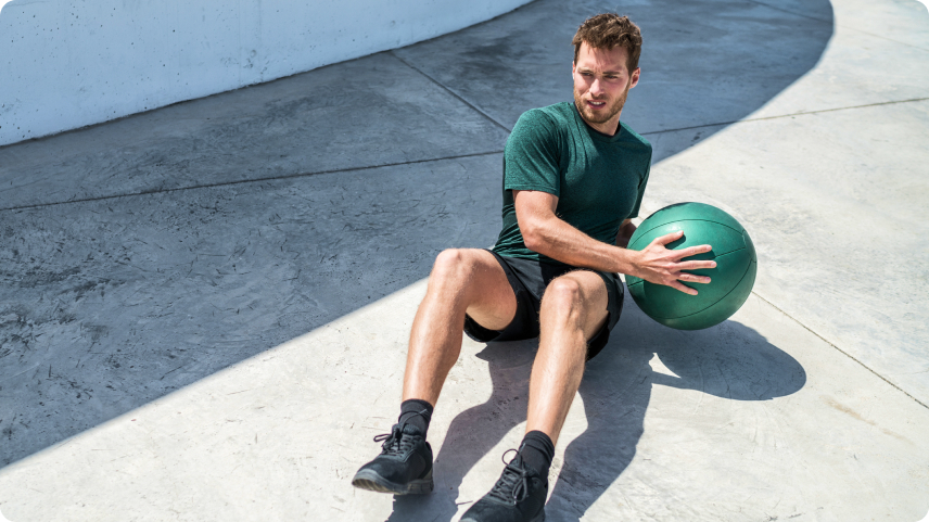 Man doing exercises with a ball