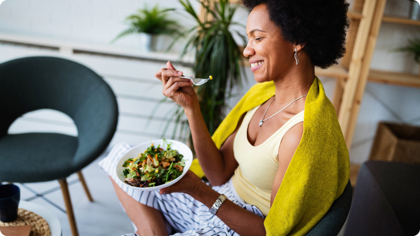 Woman eating salad